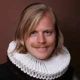 Otto, founder of Adam & Eve Tours, in a Golden Age ruff collar and curled mustache